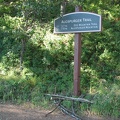 Notice all the walking sticks left at the trailhead sign for the Augspurger Mountain Trail.