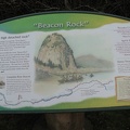 An informative sign talks about Lewis and Clark's journal describing their sighting of Beacon Rock.