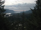 The late afternoon sun shows the clouds coming in from the west bringing rain to keep washington green. The Columbia River flows west into the sunset.