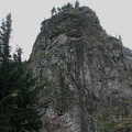 Beacon Rock from across Highway 14 showing the steep cliffs. The trail starts on the other side of Beacon Rock, then goes to this side once it nears the top.