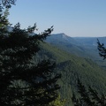 There are some views to the east through the Douglas fir trees on the south end of the summit of Bunker Hill.