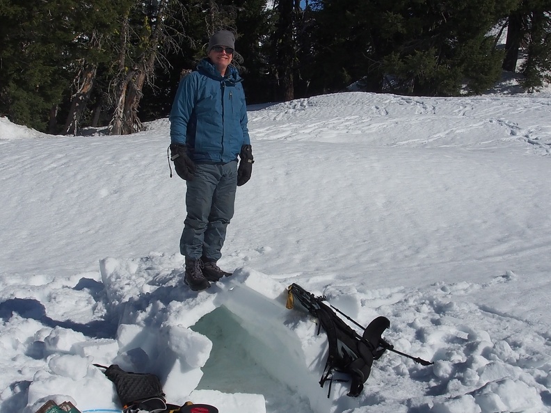 The warm weather of the previous day made it easy to cut snow blocks and the 20 degree night froze them together and made the roof strong enough to stand on.