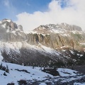 Mt. Rainier is obscured down in the valley. The Ohanapecosh River flows along the snow-covered gravel bar.