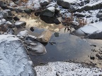 There are only a few small pools of water along the streambed. Most of the water drains into the gravel.
