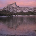 Lower Cathedral Lake reflecting Cathedral Peak at sunset in Yosemite National Park.