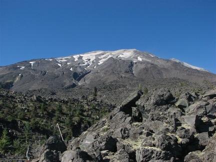 The Loowit Trail is in the lower portion of this photo of Mt. St. Helens. One of the trail markers can be seen if you look closely for a faded orange marker.