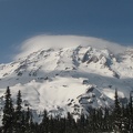 Mt. Rainier commonly has a cloud cap when the winds blow from the west.