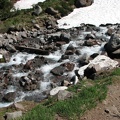 The Timberline Trail crosses McGee Creek on the way to Cairn Basin. 2010 was a late snow year. This photo was taken in late July and shows that there is no bridge over this crossing.