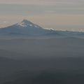 Mt. Jefferson rises above the distant mountains to the south of Mt. Hood.