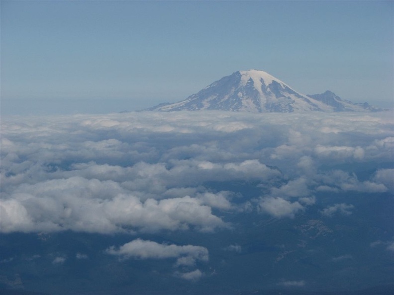 This summit-to-summit view of Mt. Rainer from Mt. Adams seems magical with the marine air creating clouds far below us.