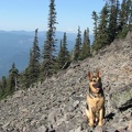 Jasmine poses along the Mt. Defiance Cutoff Trail with Mt. Rainier in the distance.