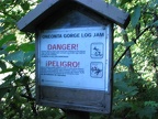 Trail sign on Oneonta Creek warning of the logjam.