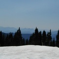 Looking at 3-Fingered Jack from the snowy slopes of Park Butte before dropping into Jefferson Park.