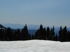 Looking at 3-Fingered Jack from the snowy slopes of Park Butte before dropping into Jefferson Park.