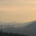 Downtown Portland in the distance taken from a viewpoint under powerlines.