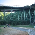 The Thurston Street Bridge crosses over the trail just at the Lower Macleay Trailhead.