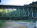 The Thurston Street Bridge crosses over the trail just at the Lower Macleay Trailhead.