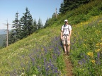 Kevin taking in the sights along  PCT heading to Table Mountain through a field of wildflowers.