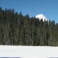 The tip of Mt. Hood can be seen from Upper Trail Lake along the Twin Lakes Trail.