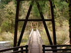 Cable and wood suspension bridge across Eagle Creek. This is looking back to the trailhead