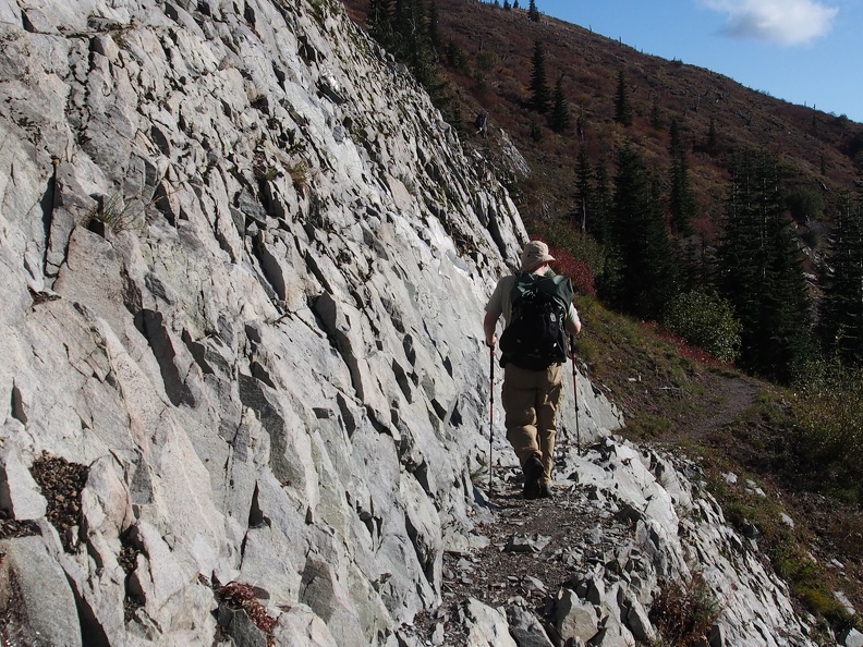 Brad easily navigates one of the stretches of trail that has been blasted out of the rock along the Boundary Trail.