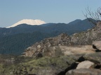 Looking east from just below the summit of Wind Mountain, Mt. Adams peeks out from the mountain ridges.