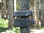 A rustic trail sign showing the side trail to North Lake on the Wyeth Trail.