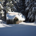 Someone has a cozy fire going in this little cabin by Summit sno park.