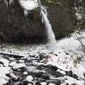 Ponytail Falls shoots out of the rocks.