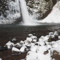 Winter weather creates an icy pool at Horsetail Falls
