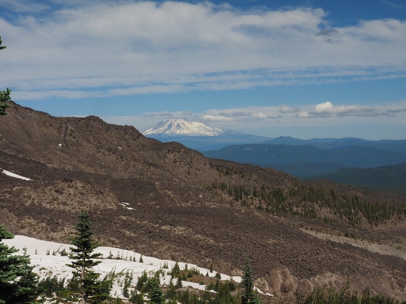 Mt. Adams comes back into view but all these blocks of lava have to be climbed over.