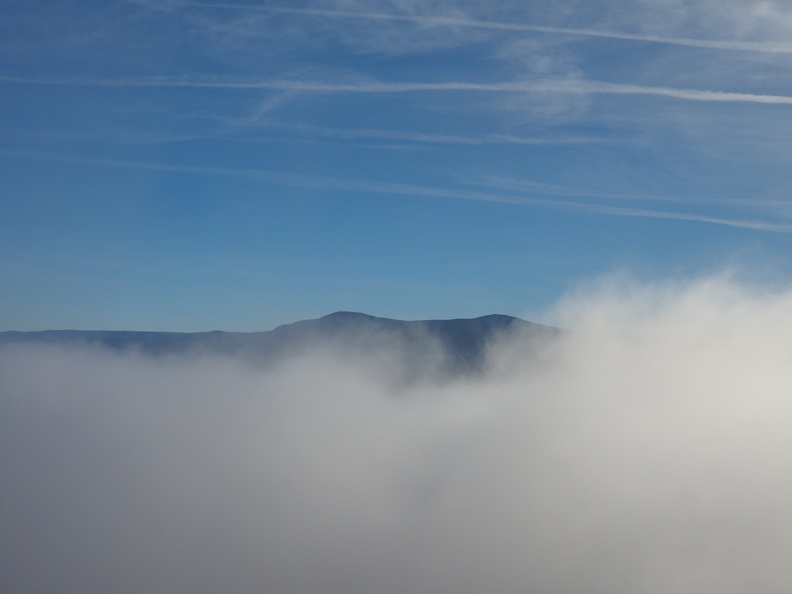 Fog wafts over distant view to the south