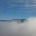 Fog wafts over distant view to the south