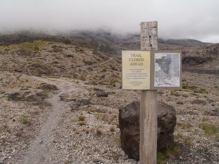 Warning sign at trail junction