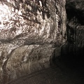 As the lava flowed through the tube, the top of the lava cooled and made ledges. 