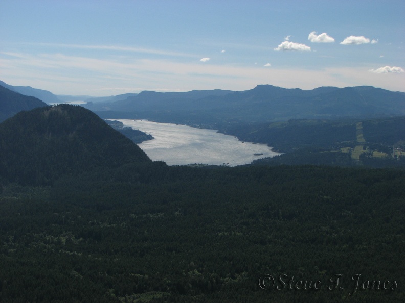 The western part of the Columbia River sparkles in the sun from this clearing in the trail.