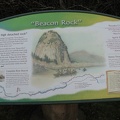 An informative sign talks about Lewis and Clark's journal describing their sighting of Beacon Rock.
