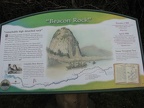 An informative sign talks about Lewis and Clark's journal describing their sighting of Beacon Rock.