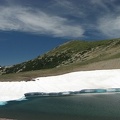 Frozen Lake is the junction for several trails. This lake is the water supply for Sunrise. The snow usually lasts all summer around this lake.