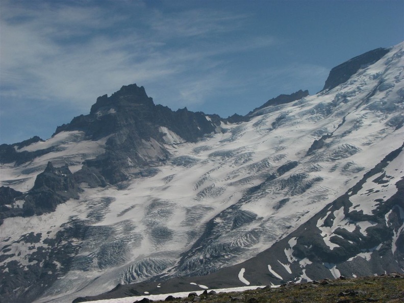 Cravasses appear on the Emmons Glacier as the winter snows melt away.