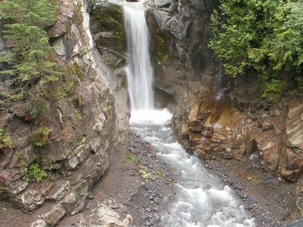 A flood several years ago flushed out the streambed below Christine Falls. It will take some time for the plants to grow back on the rocks.