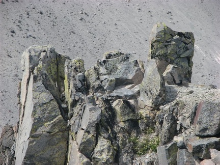 A rugged rock formation above Newton Creek viewed from Lamberson Butte. The rocks look like they could fall into Newton Canyon at any time.