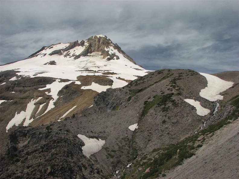 The Timberline Trail above Lamberson Butte is above timberline and the terrain becomes to harsh for most plants. A small strem flows from a snowfield and becomes part of Newton Creek.