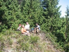 Chris, Janel, Joe, and Ryan taking a lunch break on a knoll along the Glacier View Trail.