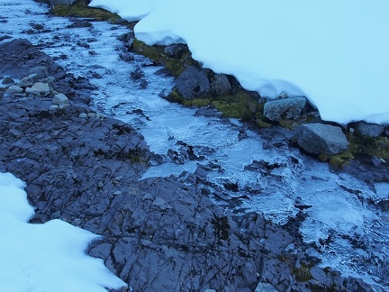 A small stream above Indian Bar is nearly frozen for the season.