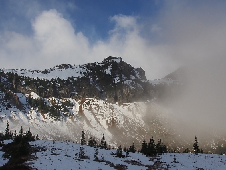 The dawn of the next day promised to be clear as the sun peeks out of the clouds. This is looking up the valley along Indian Bar.