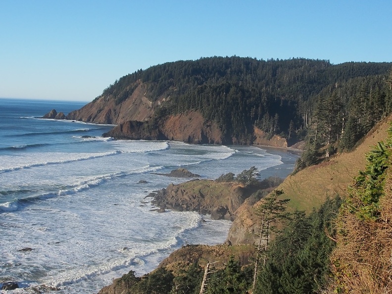 A nice picture of Tillamook Head jutting into the ocean near Indian Beach. This is from a viewpoint with a bench which is just north of Indian Beach.