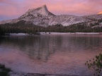 Lower Cathedral Lake reflecting Cathedral Peak at sunset in Yosemite National Park.