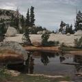Lower Cathedral Lake in Yosemite National Park looking at the glacial erratics left behind during the last ice age.
