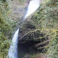 Upper Latourell Falls is an almost perfect bow tie. There is a grotto just to the right of the falls where you can kind of get behind the falls.